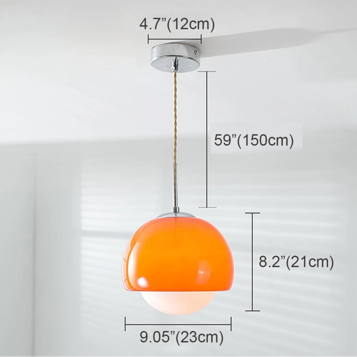 Suspension boule ronde en verre orange avec finition métal moderne