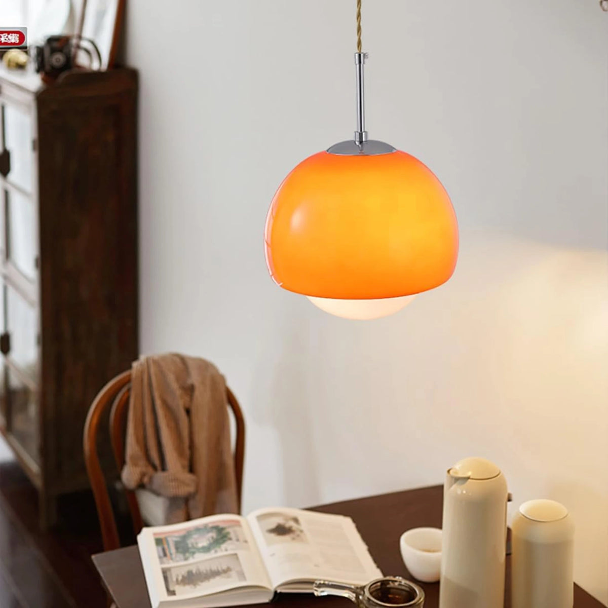 Suspension boule ronde en verre orange avec finition métal moderne