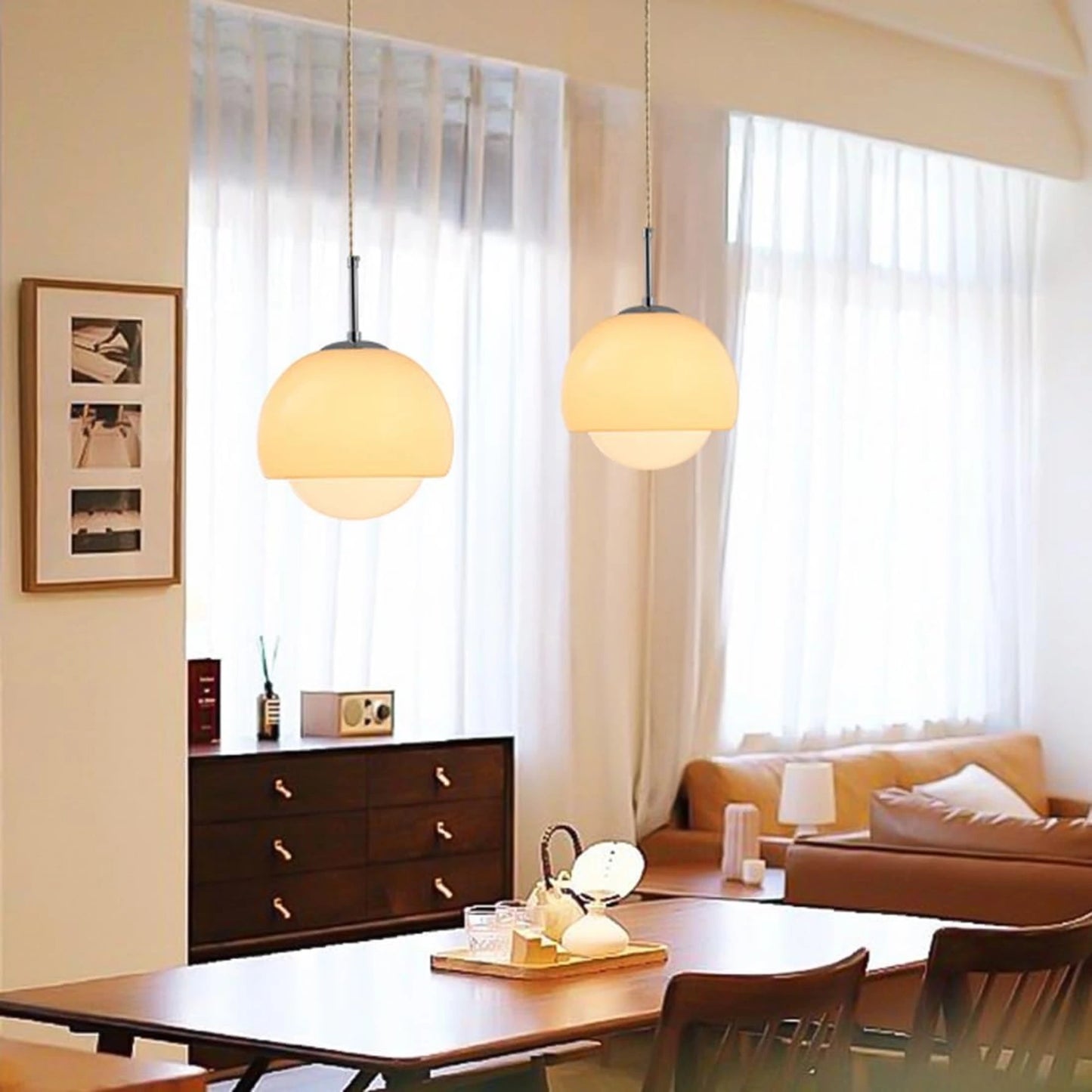 Suspension boule ronde en verre orange avec finition métal moderne