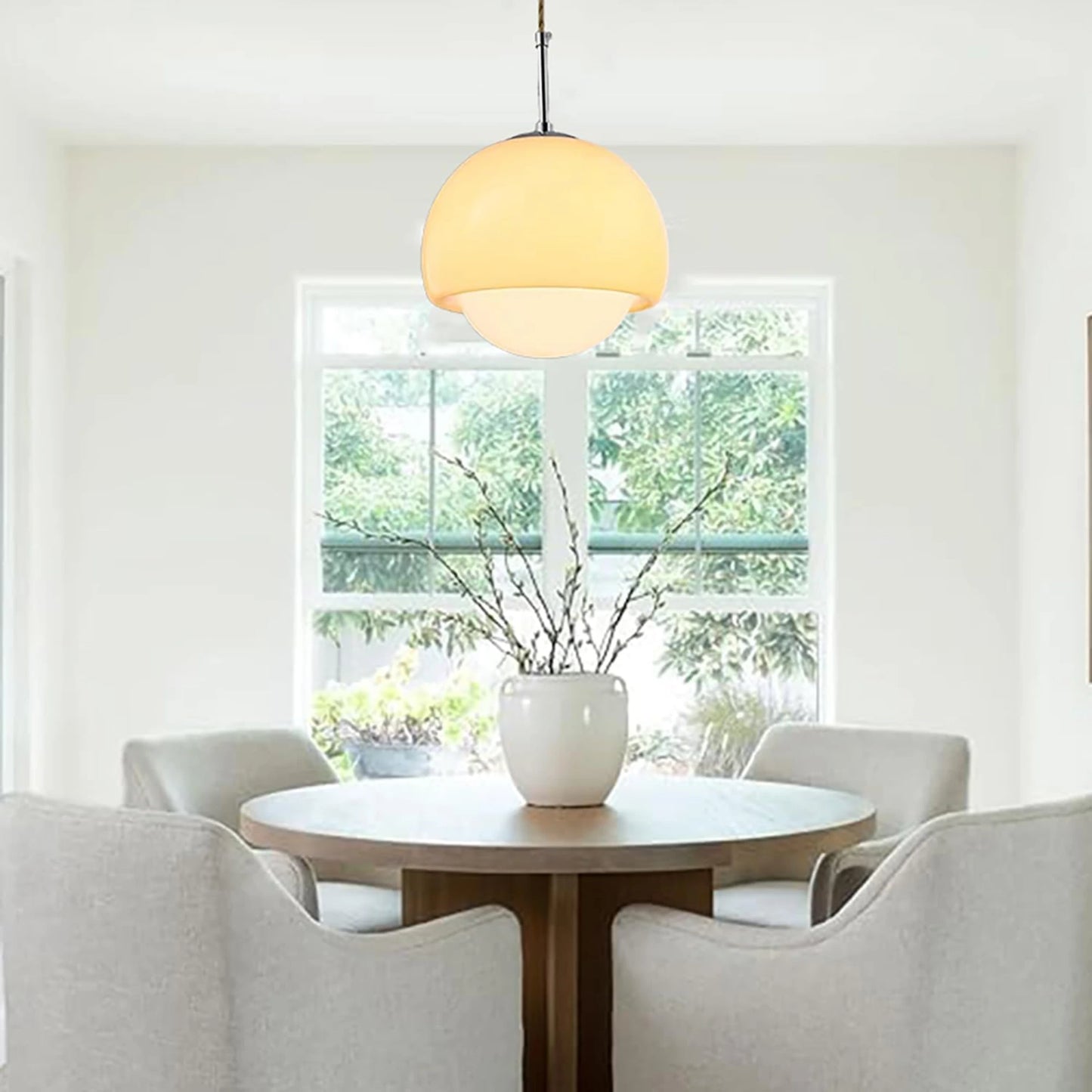 Suspension boule ronde en verre orange avec finition métal moderne