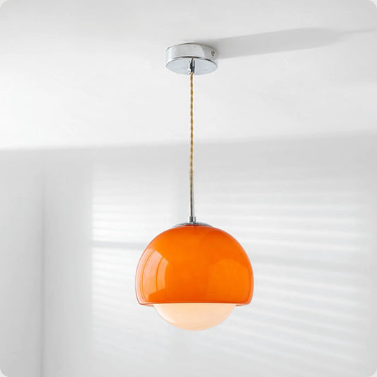 Suspension boule ronde en verre orange avec finition métal moderne
